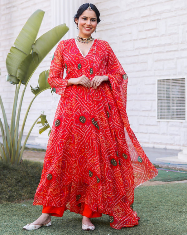 Auspicious red bandhej style trendy ruffle suit